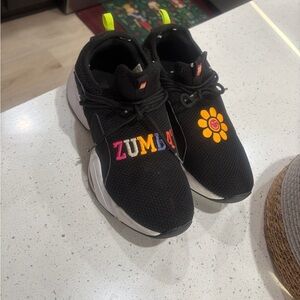 Zumba Fitness Kids Black Slip-On Sneakers with Yellow Flower and Multicolor Logo